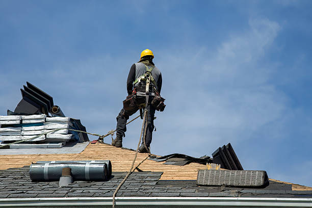 Professional Roofing technician working in King William, VA